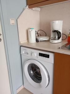 Kuchyňa alebo kuchynka v ubytovaní Hospitable appartment in the central park, Xanthi