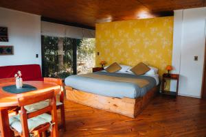 Ένα ή περισσότερα κρεβάτια σε δωμάτιο στο Cabañas Toconao +23 φωτογραφίες