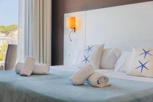 Postel nebo postele na pokoji v ubytování Hotel Miramar