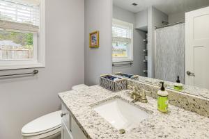 a bathroom with a sink and a toilet at 3 Mi to Dtwn Home with Patio and Grill in New Bern in New Bern +16 photos