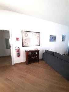 Area soggiorno di La comodità a due passi dal mare di Mondello