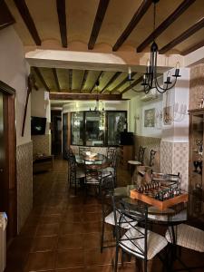 TV a/nebo společenská místnost v ubytování Hostal Camarina