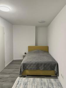Ένα ή περισσότερα κρεβάτια σε δωμάτιο στο GAIA Apartment