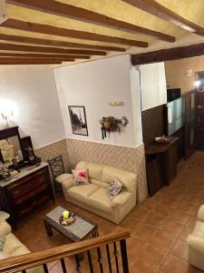 Posezení v ubytování Hostal Camarina + 29 fotografií