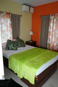 Letto o letti in una camera di AYURVEDA RESORT