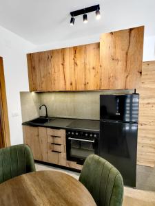 Kuchyň nebo kuchyňský kout v ubytování Vila Rosa, apartman 3