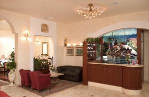 a large room with a wine shop with a table and chairs at Hotel Rosa Maria Elite in Bellaria-Igea Marina +71 photos