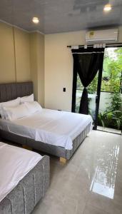Ένα ή περισσότερα κρεβάτια σε δωμάτιο στο Entrebosques Luxury Casa Quinta +45 φωτογραφίες