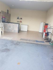 Kuchyň nebo kuchyňský kout v ubytování Vila Manguaba