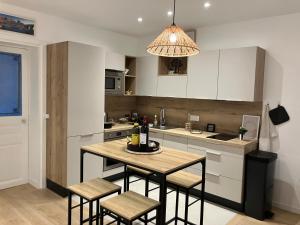 Køkken eller tekøkken på Paris - Elégant Apt Rue Mouffetard - Prestation de Luxe