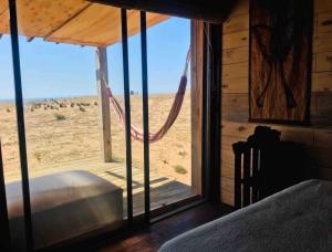 Postel nebo postele na pokoji v ubytování Ohana frente al mar