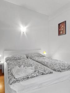 Double King Size Haven客房内的一张或多张床位