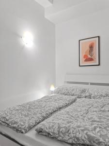 Double King Size Haven客房内的一张或多张床位