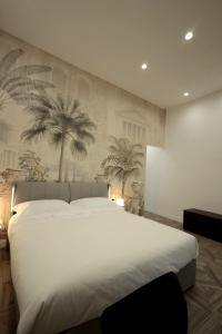 Giường trong phòng chung tại Relais Santa Lucia sul Mare, Napoli