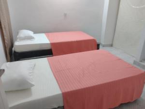 Ένα ή περισσότερα κρεβάτια σε δωμάτιο στο Apartahotel Bahia Gaira