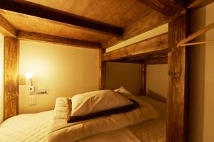 Letto o letti in una camera di Untapped Hostel