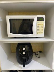 Galeriebild der Unterkunft Apt centro com garagem wifi próximo a congressos in Águas de Lindóia
