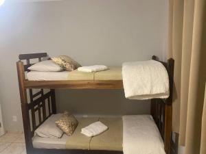 Ein Bett oder Betten in einem Zimmer der Unterkunft Apt centro com garagem wifi próximo a congressos