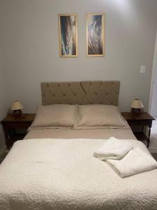 Ein Bett oder Betten in einem Zimmer der Unterkunft Apt centro com garagem wifi próximo a congressos
