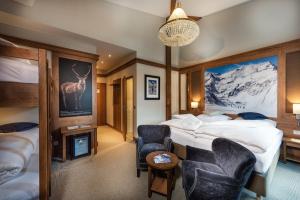 Posteľ alebo postele v izbe v ubytovaní Hotel Eden Rock