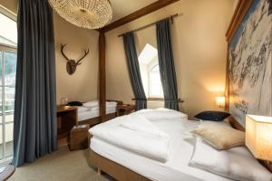 Posteľ alebo postele v izbe v ubytovaní Hotel Eden Rock