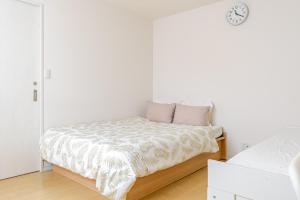 Krevet ili kreveti u jedinici u objektu EXPO 22 min,24 min to MINAMI-Namba-Dotonbori,Shinsaibashi,AMERICAMURA,Grand Kagetsu,26 min to MINAMI-Nippombashi-Kuromon Market,National Bunraku,13 min to NISHI-Osakako-KAIYUKAN,Santa Maria,LEGOLAND,Tempozan Ferris,Tempozan Marketplace,Park