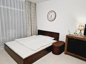 Postel nebo postele na pokoji v ubytování Grand Kamelia + 37 fotografií