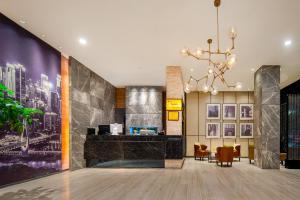 Fotografie z fotogalerie ubytování 重庆时代同辉酒店 龙湖时代天街重医附一院店 v destinaci Čchung-čching