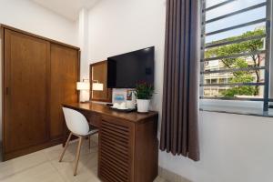 TV a/nebo společenská místnost v ubytování Saigon Park Hotel Dist 1