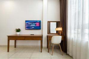 TV a/nebo společenská místnost v ubytování Saigon Park Hotel Dist 1