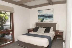 Aireys Inlet Getaway客房内的一张或多张床位