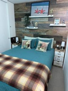 Ένα ή περισσότερα κρεβάτια σε δωμάτιο στο Bello departamento Frente al mar- Concon - Costa Higuerillas