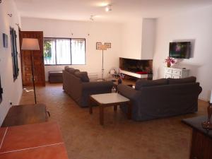 a living room with two couches and a table at Luxurious Villa in Marbella with Swimming Pool in Marbella