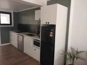 Η κουζίνα ή μικρή κουζίνα στο Lagoon Apartments
