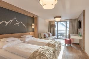 Katil atau katil-katil dalam bilik di Hotel Gurglhof Superior