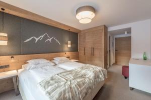 Katil atau katil-katil dalam bilik di Hotel Gurglhof Superior