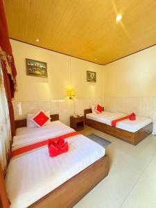 Letto o letti in una camera di Nice Guesthouse