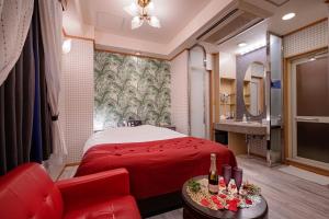 Postel nebo postele na pokoji v ubytování ホテルホワイトシティ23Adults only