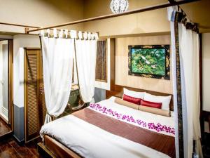 Postel nebo postele na pokoji v ubytování Hotel Balian Resort Kinshicho