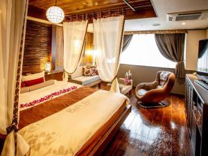 Postel nebo postele na pokoji v ubytování Hotel Balian Resort Kinshicho