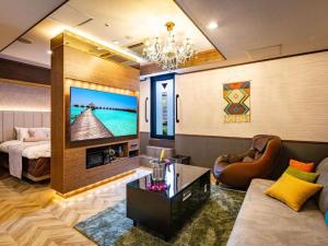 TV a/nebo společenská místnost v ubytování Hotel Balian Resort Kinshicho