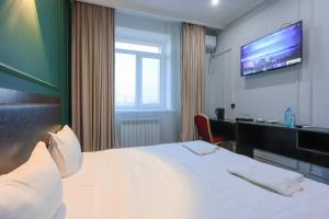 Giường trong phòng chung tại Hotel Vivaldis