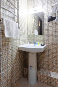 Phòng tắm tại Hotel Vivaldis +15 ảnh