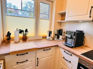 Køkken eller tekøkken på Strandwohnungen Sellin - WG07 mit 2 Balkonen + 12 billeder