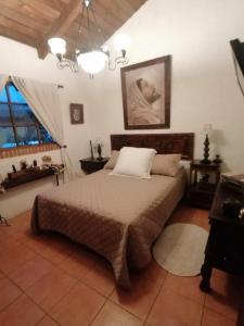 Ένα ή περισσότερα κρεβάτια σε δωμάτιο στο La casa del abuelo
