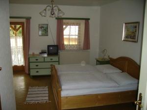 Кровать или кровати в номере Binderhof