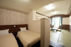 Gotemba Kogen Tokinosumika客房内的一张或多张床位