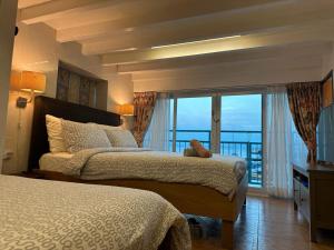 Postel nebo postele na pokoji v ubytování Lamma Bali