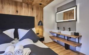 Łóżko lub łóżka w pokoju w obiekcie Chalet Wallehen