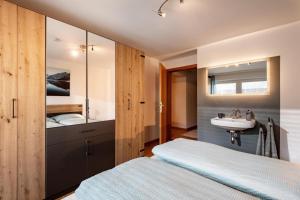 Ένα ή περισσότερα κρεβάτια σε δωμάτιο στο Ferienwohnung Pulverer